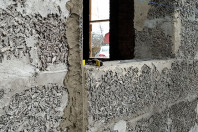 Оштукатуривание стен фасадов жилого дома